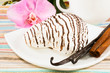 striped marshmallow on a saucer with a vanilla, cinnamon