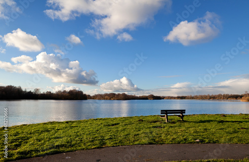 Photo: lonely bench by lake lonely bench by lake