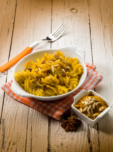 Photo: baked pasta with curry ricotta pine nuts and dried grape baked pasta with curry ricotta pine nuts and dried grape