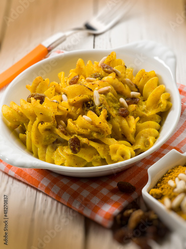Photo: baked pasta with curry ricotta pine nuts and dried grape baked pasta with curry ricotta pine nuts and dried grape
