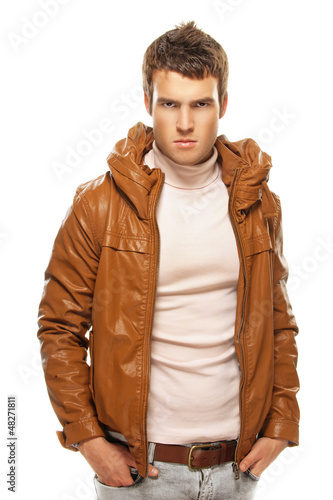 Photo: young man in brown jacket young man in brown jacket