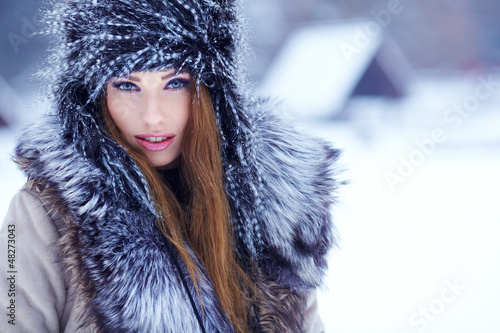 Photo: Young woman in winter Young woman in winter