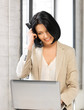 happy woman with laptop computer and credit card