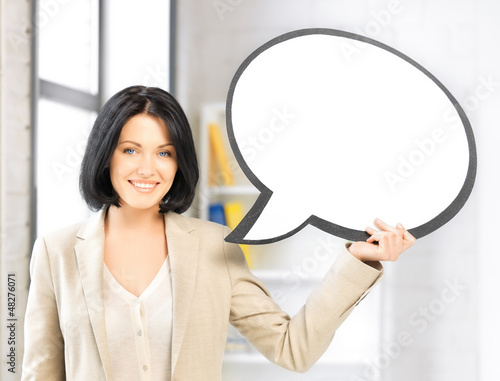 Photo: smiling businesswoman with blank text bubble smiling businesswoman with blank text bubble