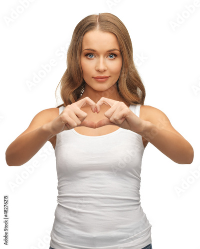 Photo: woman forming heart shape woman forming heart shape