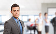 Businessman in front of his team