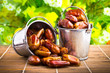 Delicious dried dates in tin pail