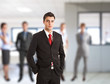 Businessman in front of his team
