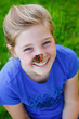 beautiful girl with a butterfly on her nose