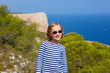 child kid girl in mediterranean sea with sailor stripes