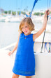 child kid girl in marina boat on summer vacations