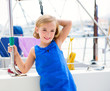 child kid girl in marina boat on summer vacations