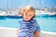 child kid girl in marina boat on summer vacations