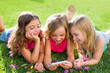 Photo: children friend girls playing internet with smartphone children friend girls playing internet with smartphone