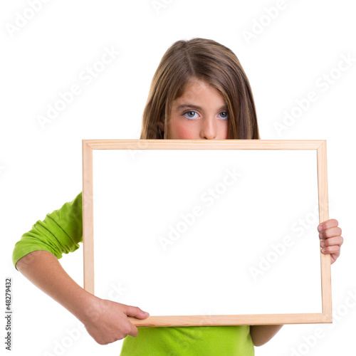 Photo: child girl with white frame copy space white blackboard child girl with white frame copy space white blackboard
