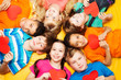 Boys and girls in circle with hearts
