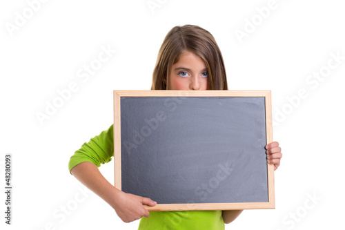 Photo: child girl with white frame copy space black blackboard child girl with white frame copy space black blackboard