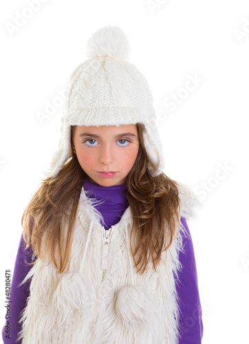 Photo: blue eyes child kid girl with white winter cap fur blue eyes child kid girl with white winter cap fur