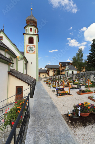 Photo: San Cassiano - alpine church and graveyard San Cassiano - alpine church and graveyard