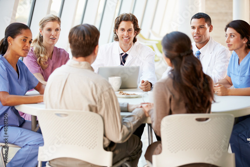 Photo: Medical Team Discussing Treatment Options With Patients Medical Team Discussing Treatment Options With Patients