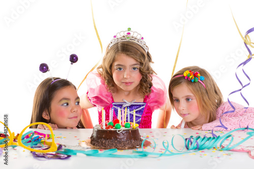 Photo: children kid girls birthday party look excited chocolate cake children kid girls birthday party look excited chocolate cake