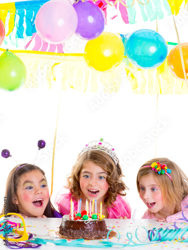 Photo: children kid girls birthday party look excited chocolate cake children kid girls birthday party look excited chocolate cake