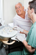 Radiologic Technologist With Patient