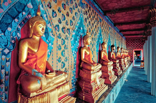Photo: golden statues of Buddha in Wat Arun temple, Bangkok golden statues of Buddha in Wat Arun temple, Bangkok