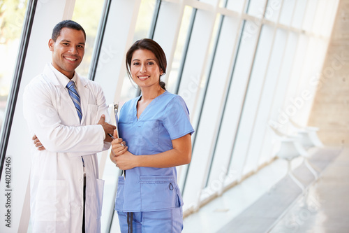 Photo: Portrait Of Medical Staff In Corridor Of Modern Hospital Portrait Of Medical Staff In Corridor Of Modern Hospital