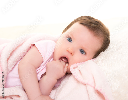 Photo: baby girl with toothache in pink with white fur baby girl with toothache in pink with white fur