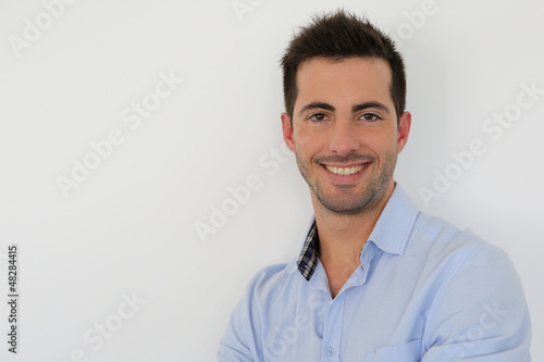 Photo: Portrait of handsome guy on white background Portrait of handsome guy on white background