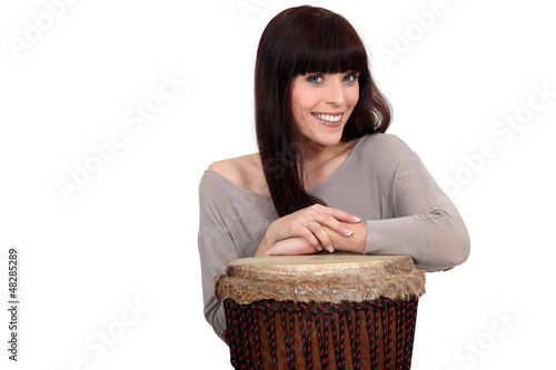 Photo: Woman posing with her drum Woman posing with her drum