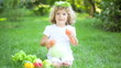 Video: Happy child playing with fruits and vegetables in spring park Happy child playing with fruits and vegetables in spring park