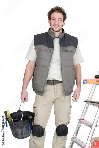 Photo: Tiler preparing to start project Tiler preparing to start project