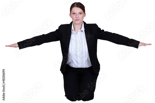 Photo: Businesswoman with her arms out Businesswoman with her arms out