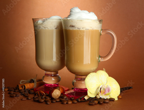 Photo: Fragrant coffee latte in glasses cups with spices, Fragrant coffee latte in glasses cups with spices,