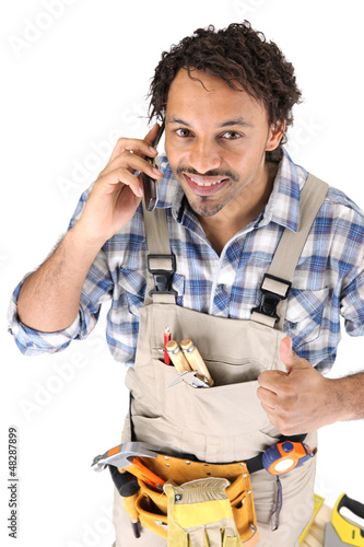 Photo: Carpenter receiving good news over the phone Carpenter receiving good news over the phone