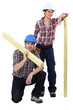 craftsman and craftswoman posing together