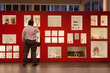 Visitor in a museum looking at relics