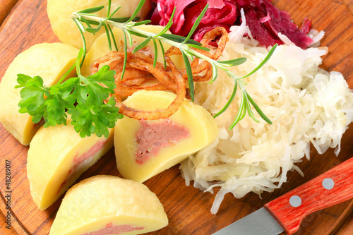 Photo: Meat stuffed potato dumplings with shredded cabbage Meat stuffed potato dumplings with shredded cabbage