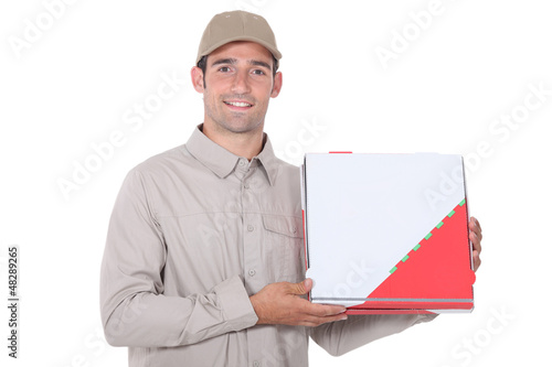 Photo: A pizza deliveryman. A pizza deliveryman.