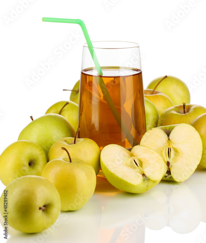 Photo: Useful apple juice with apples around isolated on white Useful apple juice with apples around isolated on white