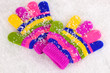 Children's mittens in snow