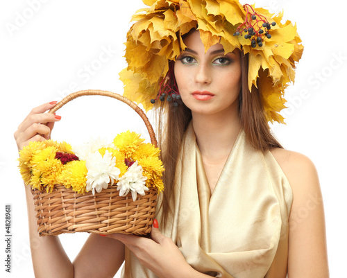 Photo: beautiful young woman with yellow autumn wreath and basket with beautiful young woman with yellow autumn wreath and basket with