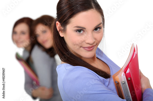 Photo: Teens with folders Teens with folders