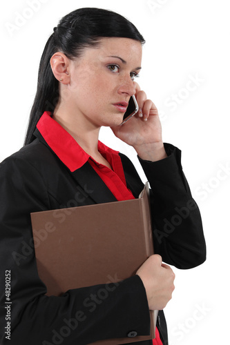 Photo: young businesswoman on the phone young businesswoman on the phone
