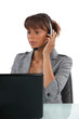 Receptionist wearing head-set