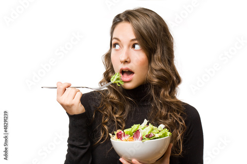 Photo: Brunette with fresh salad. Brunette with fresh salad.