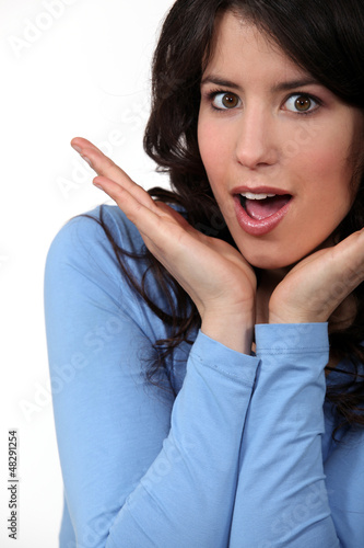 Photo: woman having a good surprise woman having a good surprise