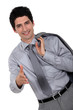 young businessman stretching out his hand to shake hands
